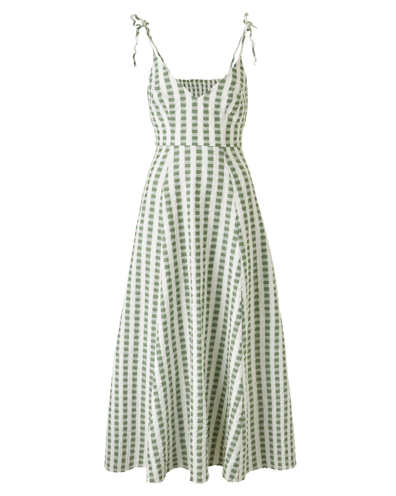Wiggy Kit | Ekberg Dress (Green Gingham) | Product image of maxi gingham dress with beach in background
