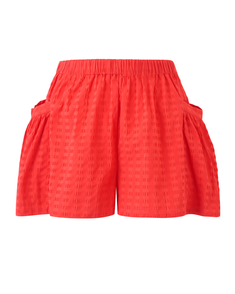 Wiggy Kit | The Pocket Short | Product image of  orange shorts